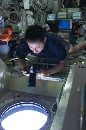 Ed Lu on the ISS with Camera