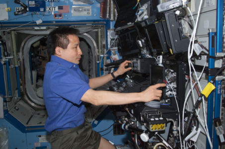 Ed Lu on the ISS with robotics